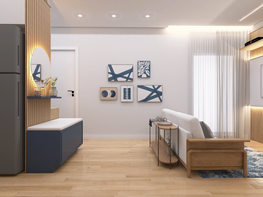 Sofá em uma sala pequena, com decoração de madeira e quadros na parede