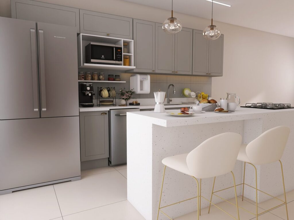 Uma mesa, duas cadeiras ao lado de uma bancada de cozinha